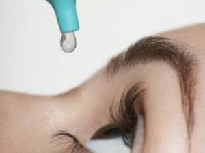 girl using eye drops, relief